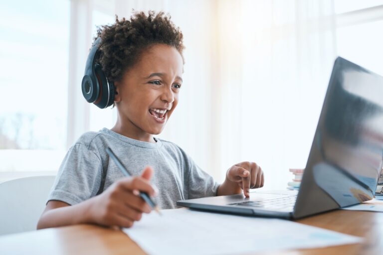 young boy virtual learning featured